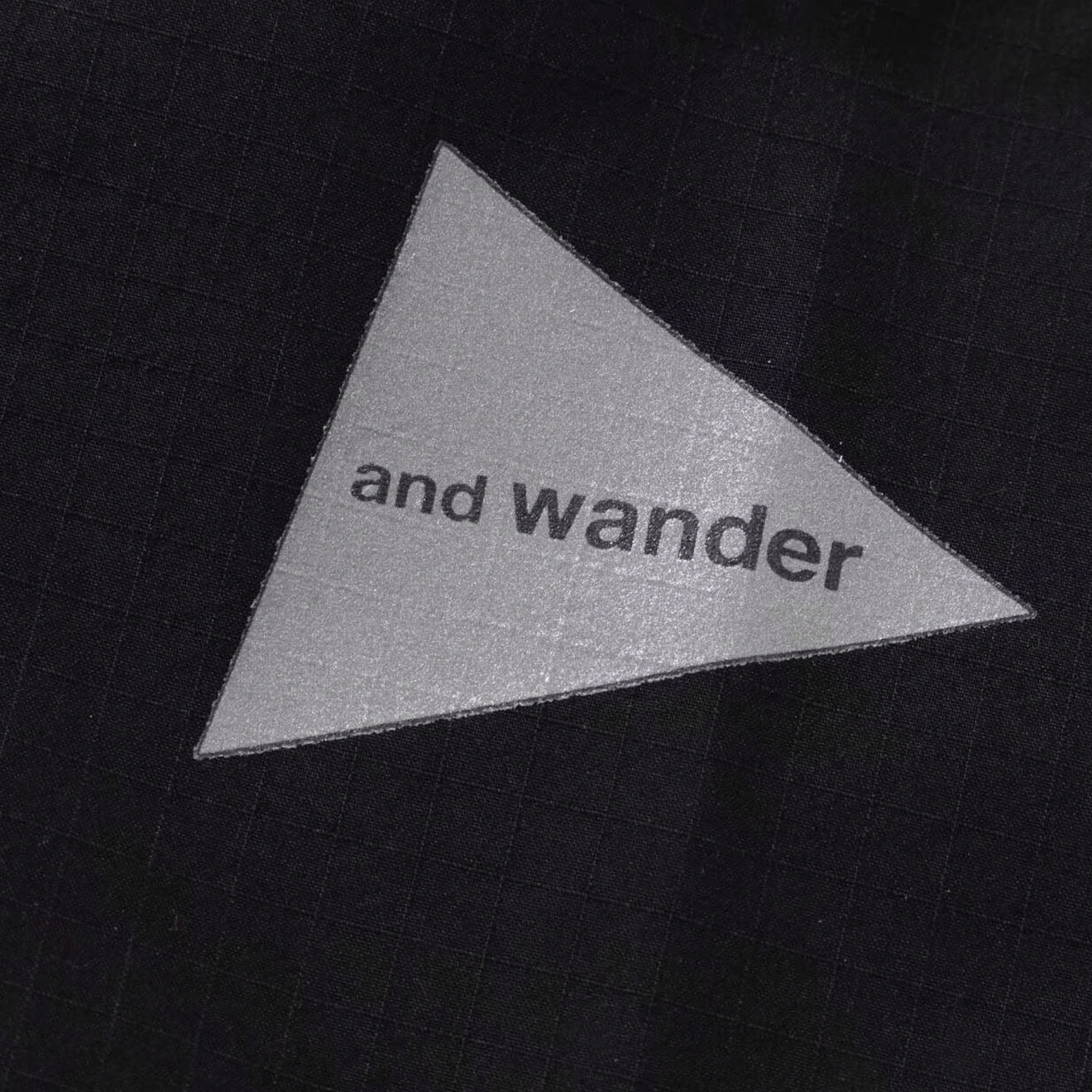 And Wander Womens C/N Rip S/S Shirt Black Best Price Online